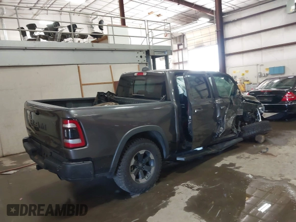 2019 Ram 1500 Rebel with VIN 1C6SRFLT2KN537313, listed as a IAAI auction lot 42545382 with Not provided miles and . Bid and sale history available at DreamBid. Image 4.