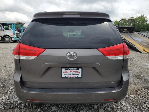 2012 Toyota Sienna XLE AAS with VIN 5TDYK3DC6CS189399, listed as a Copart auction lot 57188555 with Not provided miles and Clean title. Bid and sale history available at DreamBid. Image 6.