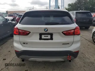 2019 BMW X1 xDrive28i with VIN WBXHT3C52K3H34021, listed as a Copart auction lot 64032535 with 30,752 mi miles and Salvage title. Bid and sale history available at DreamBid. Image 6.