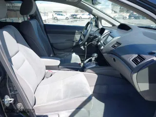 2010 Honda Civic Sdn LX with VIN 2HGFA1F55AH302155, listed as a IAAI auction lot 41799279 with 122,638 mi miles. Bid and sale history available at carsss.com. Image 5.