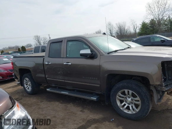 2014 Chevrolet Silverado 1500 LTZ with VIN 1GCVKSEC8EZ140508, listed as a IAAI auction lot 41821397 with 108,308 mi miles and . Bid and sale history available at DreamBid. Image 14.