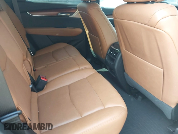 2021 Cadillac XT5 AWD Premium Luxury z VIN 1GYKNDRS8MZ217572, wystawiony jako IAAI lot #42190571 z przebiegiem 25 100 mil mil oraz . Historia ofert i sprzedaży dostępna na DreamBid. Obrazek 8.