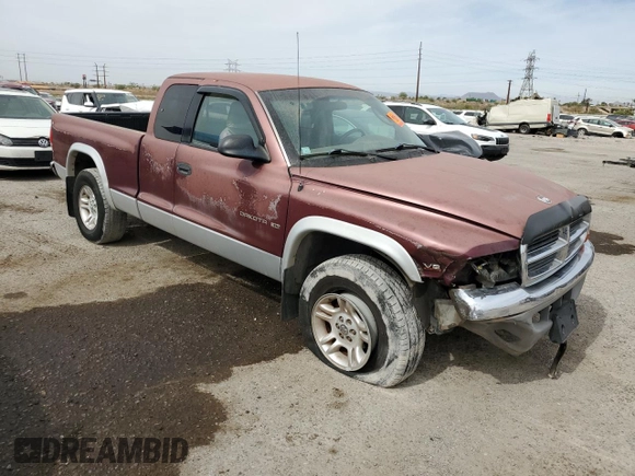 2001 Dodge Dakota Sport z VIN 1B7GG22N81S152399, wystawiony jako Copart lot #58543135 z przebiegiem 218 133 mil mil oraz Szkoda całkowita • Salvage title. Historia ofert i sprzedaży dostępna na DreamBid. Obrazek 4.