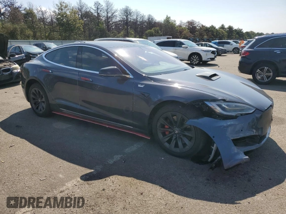 2019 Tesla Model S 100D с VIN 5YJSA1E42KF312803, выставлен на аукционе Copart как лот 71246484 с пробегом 89 820 миль миль и На запчасти • Non repairable. История ставок и продаж доступна на DreamBid. Изображение 4.