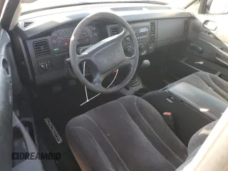 2002 Dodge Dakota with VIN 1B7FL16XX2S702359, listed as a Copart auction lot 43026735 with 103,633 mi miles and Salvage Title. Bid and sale history available at carsss.com. Image 8.