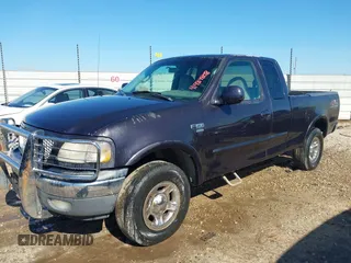 1999 Ford F-150 with VIN 1FTRX18W5XNA08724, listed as a IAAI auction lot 41484808 with Not provided miles and . Bid and sale history available at DreamBid. Image 2.