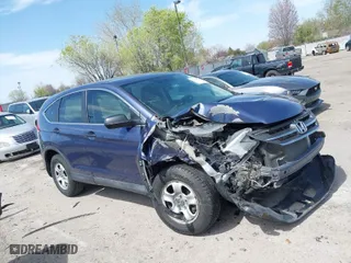 2014 Honda CR-V LX with VIN 2HKRM4H37EH607900, listed as a IAAI auction lot 42021342 with 100,082 mi miles. Bid and sale history available at carsss.com. Image 1.