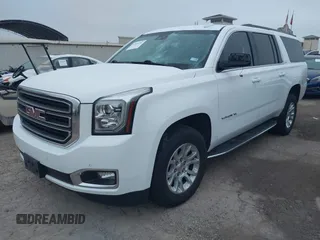 2019 GMC Yukon XL SLT z VIN 1GKS1GKC8KR395425, wystawiony jako IAAI lot #41910104 z przebiegiem 105 760 mil mil oraz . Historia ofert i sprzedaży dostępna na DreamBid. Obrazek 2.