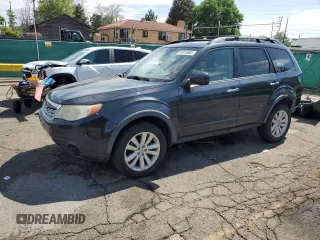 2012 Subaru Forester X Premium with VIN JF2SHBDC6CH415672, listed as a Copart auction lot 61815565 with 117,692 mi miles and Salvage title. Bid and sale history available at DreamBid. Image 1.