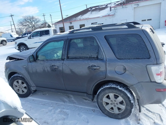 2009 Mercury Mariner with VIN 4M2CU91GX9KJ08073, listed as a IAAI auction lot 41404100 with 90,466 mi miles. Bid and sale history available at carsss.com. Image 14.