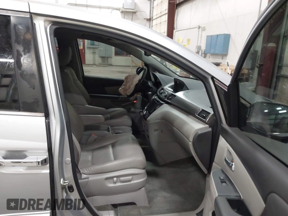 2015 Honda Odyssey EX-L with VIN 5FNRL5H66FB028822, listed as a IAAI auction lot 42067242 with 122,354 mi miles and . Bid and sale history available at carsss.com. Image 5.