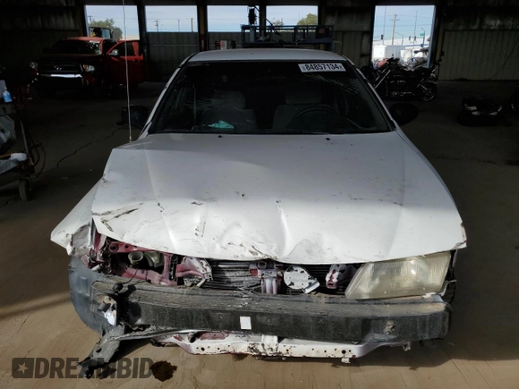 1997 Nissan Sentra XE with VIN 1N4AB41D9VC715071, listed as a Copart auction lot 84857134 with 162,357 mi miles and Salvage title. Bid and sale history available at DreamBid. Image 5.