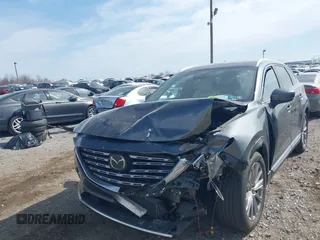 2021 Mazda CX-9 Signature with VIN JM3TCBEY5M0523199, listed as a IAAI auction lot 41916480 with 56,772 mi miles. Bid and sale history available at carsss.com. Image 6.