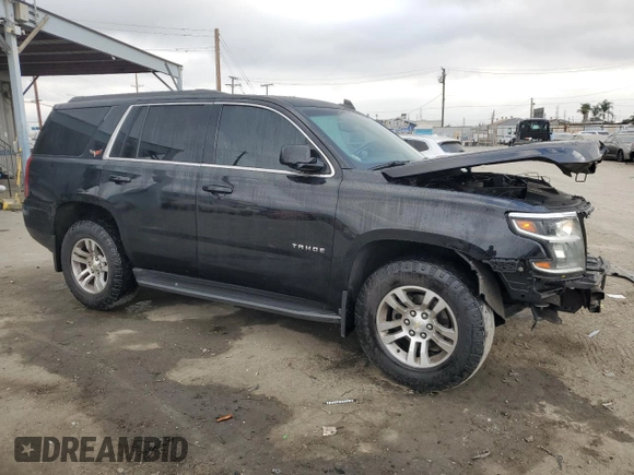 2015 Chevrolet Tahoe LS with VIN 1GNSCAKC3FR649087, listed as a Copart auction lot 86782064 with 152,094 mi miles and Salvage title. Bid and sale history available at DreamBid. Image 4.