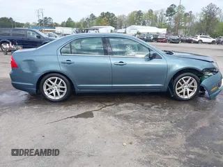 2012 Ford Fusion SEL with VIN 3FAHP0JA8CR162233, listed as a IAAI auction lot 42019169 with 214,772 mi miles and . Bid and sale history available at carsss.com. Image 13.