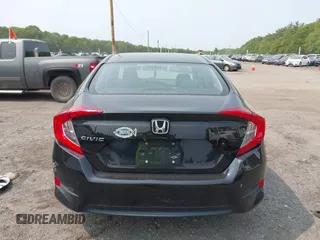 2017 Honda Civic LX z VIN 2HGFC2F50HH539680, wystawiony jako IAAI lot #42434762 z przebiegiem 112 572 mil mil oraz . Historia ofert i sprzedaży dostępna na DreamBid. Obrazek 16.