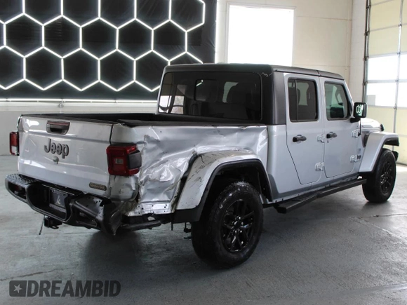 2023 Jeep Gladiator Freedom с VIN 1C6HJTAGXPL518694, выставлен на аукционе Copart как лот 54447635 с пробегом 9 460 миль миль и Списание • Salvage title. История ставок и продаж доступна на DreamBid. Изображение 3.