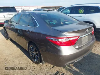 2015 Toyota Camry XLE with VIN 4T1BF1FK1FU895551, listed as a IAAI auction lot 40253286 with 221,273 mi miles and . Bid and sale history available at DreamBid. Image 3.