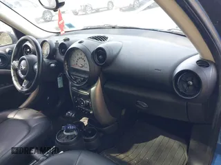 2014 MINI Countryman with VIN WMWZB3C59EWR37439, listed as a IAAI auction lot 42110149 with 181,661 mi miles and . Bid and sale history available at DreamBid. Image 5.
