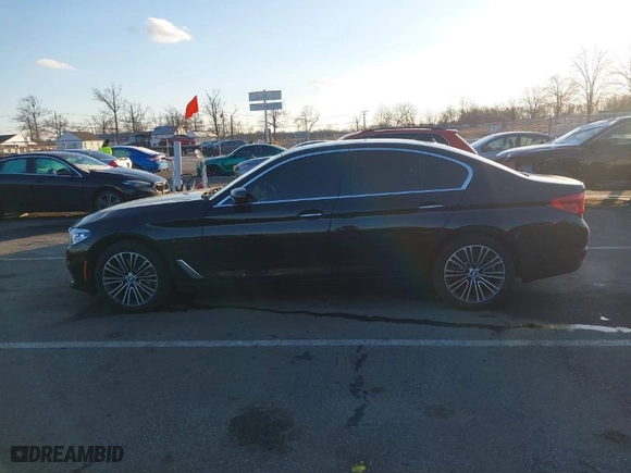 2018 BMW 5 Series 530i xDrive with VIN WBAJA7C58JWA72127, listed as a IAAI auction lot 41548417 with 80,680 mi miles. Bid and sale history available at carsss.com. Image 14.
