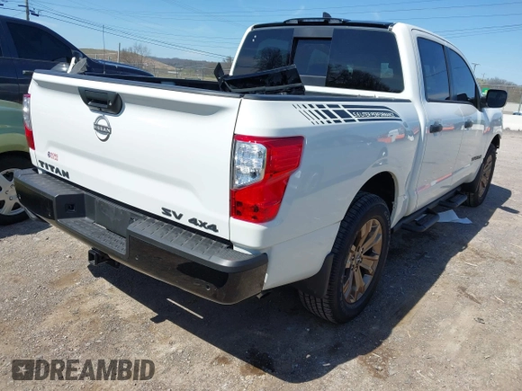 2024 Nissan Titan Pro-4X with VIN 1N6AA1EDXRN113731, listed as a IAAI auction lot 41821782 with 986 mi miles and . Bid and sale history available at DreamBid. Image 4.