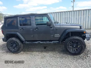 2017 Jeep Wrangler Unlimited Sport with VIN 1C4BJWDG6HL517779, listed as a IAAI auction lot 42134534 with 128,701 mi miles and . Bid and sale history available at DreamBid. Image 12.