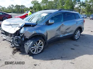 2015 Mazda CX-9 Sport with VIN JM3TB2BA1F0467162, listed as a IAAI auction lot 41565602 with 127,957 mi miles and . Bid and sale history available at carsss.com. Image 17.