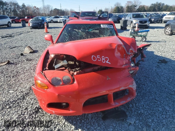 1998 Mitsubishi 3000GT z VIN JA3AM44H1WY000582, wystawiony jako Copart lot #83478284 z przebiegiem 169 140 mil mil oraz Szkoda całkowita • Salvage title. Historia ofert i sprzedaży dostępna na DreamBid. Obrazek 5.