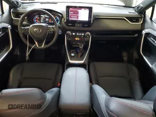 2021 Toyota RAV4 XSE with VIN JTMFB3FV5MD035494, listed as a Copart auction lot 61256085 with 54,940 mi miles and Salvage title. Bid and sale history available at DreamBid. Image 8.
