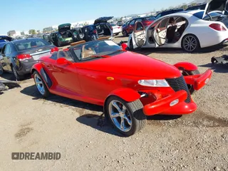 1999 Plymouth Prowler z VIN 1P3EW65G4XV503282, wystawiony jako IAAI lot #41282258 z przebiegiem 58 866 mil mil oraz . Historia ofert i sprzedaży dostępna na DreamBid. Obrazek 1.