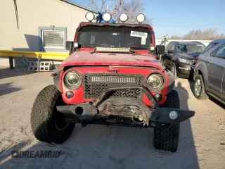 2016 Jeep Wrangler Unlimited Sport with VIN 1C4BJWDG2GL235220, listed as a Copart auction lot 48978005 with 126,863 mi miles and Salvage Title. Bid and sale history available at DreamBid. Image 5.