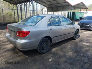 2003 Toyota Corolla CE with VIN 1NXBR32E23Z111392, listed as a IAAI auction lot 42054042 with 129,332 mi miles and . Bid and sale history available at DreamBid. Image 4.