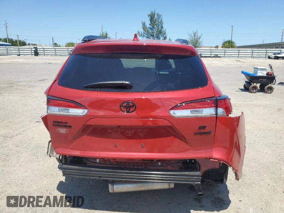2023 Toyota Corolla Cross Hybrid S z VIN 7MUFBABG3PV011365, wystawiony jako Copart lot #56407204 z przebiegiem Nie podano mil oraz Szkoda całkowita • Salvage title. Historia ofert i sprzedaży dostępna na DreamBid. Obrazek 6.