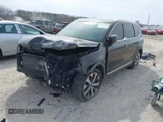 2021 Kia Telluride EX with VIN 5XYP34HC0MG162318, listed as a IAAI auction lot 41837489 with 110,922 mi miles and . Bid and sale history available at DreamBid. Image 2.