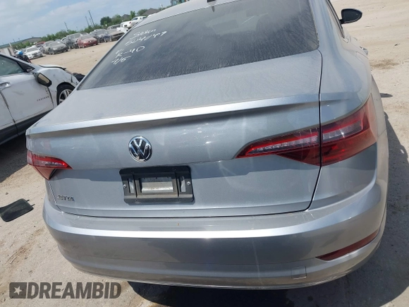 2021 Volkswagen Jetta S z VIN 3VWC57BU9MM015930, wystawiony jako IAAI lot #42020727 z przebiegiem 67 982 mil mil oraz . Historia ofert i sprzedaży dostępna na DreamBid. Obrazek 16.