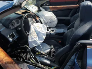 2006 Aston Martin DB9 z VIN SCFAB02A26GB04627, wystawiony jako Copart lot #68314504 z przebiegiem Nie podano mil oraz Szkody całkowita. Historia ofert i sprzedaży dostępna na DreamBid. Obrazek 7.