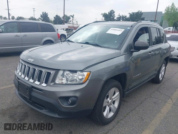 2011 Jeep Compass with VIN 1J4NF1FB7BD244088, listed as a IAAI auction lot 41889165 with 93,576 mi miles. Bid and sale history available at carsss.com. Image 6.