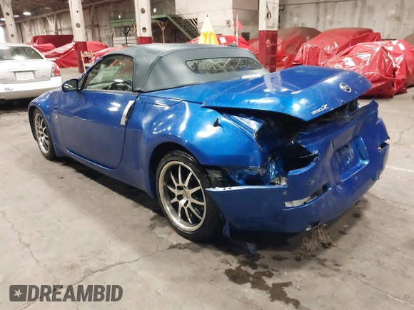 2005 Nissan 350Z Touring z VIN JN1AZ36A95M753704, wystawiony jako IAAI lot #41226946 z przebiegiem 94 351 mil mil oraz . Historia ofert i sprzedaży dostępna na DreamBid. Obrazek 3.