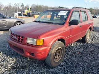 1999 Isuzu Rodeo S with VIN 4S2CM58W1X4356519, listed as a IAAI auction lot 41693480 with 225,839 mi miles and . Bid and sale history available at DreamBid. Image 2.