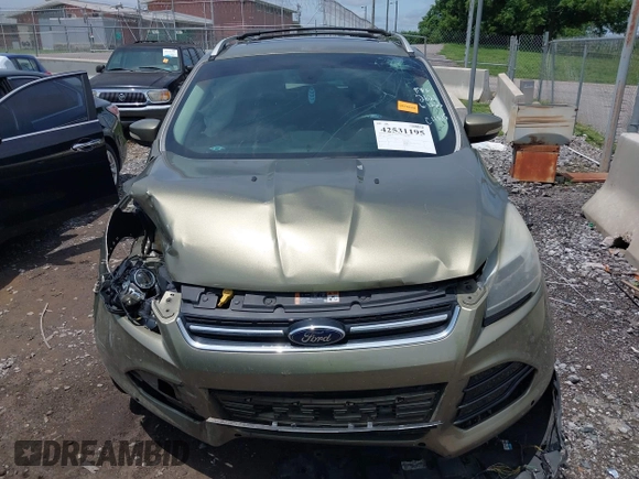 2014 Ford Escape Titanium с VIN 1FMCU0J93EUA92621, выставлен на аукционе IAAI как лот 42531195 с пробегом 170 423 миль миль и . История ставок и продаж доступна на DreamBid. Изображение 12.