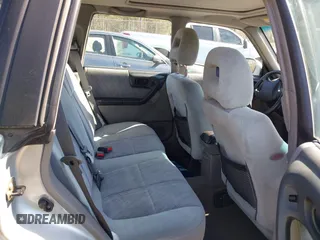 2002 Subaru Forester S w/Premium Pkg with VIN JF1SF65682H733026, listed as a IAAI auction lot 41788587 with 153,070 mi miles. Bid and sale history available at carsss.com. Image 8.