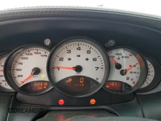 2001 Porsche 911 z VIN WP0CA29951S653243, wystawiony jako Copart lot #55835075 z przebiegiem 142 918 mil mil oraz Szkody całkowita. Historia ofert i sprzedaży dostępna na DreamBid. Obrazek 9.