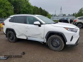 2023 Toyota RAV4 Hybrid XLE with VIN 2T3RWRFV6PW165165, listed as a Copart auction lot 59011275 with 64,740 mi miles and Clean title. Bid and sale history available at DreamBid. Image 4.
