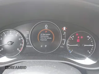 2024 Mazda CX-50 Premium z VIN 7MMVABDY8RN209081, wystawiony jako IAAI lot #42009149 z przebiegiem 18 369 mil mil oraz . Historia ofert i sprzedaży dostępna na DreamBid. Obrazek 7.