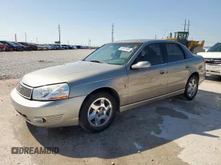 2003 Saturn LS z VIN 1G8JU54F43Y543422, wystawiony jako Copart lot #52357405 z przebiegiem 122 099 mil mil oraz Szkody całkowita. Historia ofert i sprzedaży dostępna na DreamBid. Obrazek 1.