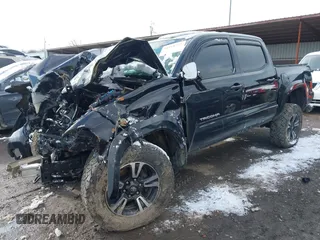2017 Toyota Tacoma SR5 with VIN 5TFCZ5ANXHX061031, listed as a IAAI auction lot 41218297 with Not Provided miles and . Bid and sale history available at DreamBid. Image 2.