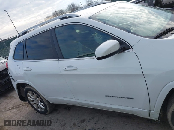 2018 Jeep Cherokee Overland with VIN 1C4PJMJX7JD594319, listed as a IAAI auction lot 41177860 with 128,925 mi miles. Bid and sale history available at carsss.com. Image 13.