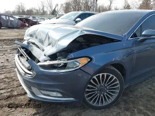 2018 Ford Fusion Titanium with VIN 3FA6P0D94JR187880, listed as a IAAI auction lot 41690869 with 120,214 mi miles and . Bid and sale history available at DreamBid. Image 18.