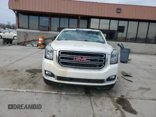 2015 GMC Yukon XL SLT with VIN 1GKS2HKC8FR259966, listed as a Copart auction lot 50410195 with 158,367 mi miles and Salvage Title. Bid and sale history available at carsss.com. Image 5.
