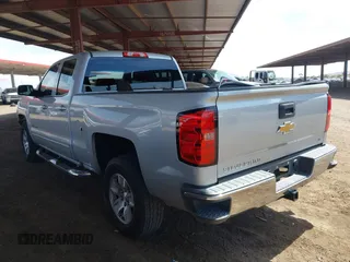 2016 Chevrolet Silverado 1500 LT with VIN 1GCRCREC3GZ185219, listed as a IAAI auction lot 41970474 with 124,101 mi miles and . Bid and sale history available at DreamBid. Image 3.